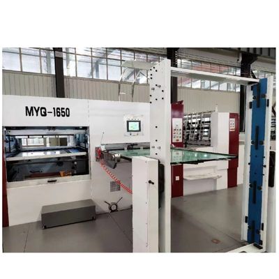 Machine à découper et à déchiqueter à la matrice automatique pour carton ondulé