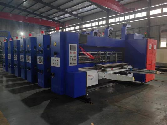 Machine automatique de fabrication de boîtes de carton ondulée